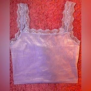 This is a barely worn forever 21 tank top it’s very soft and a lavender color.